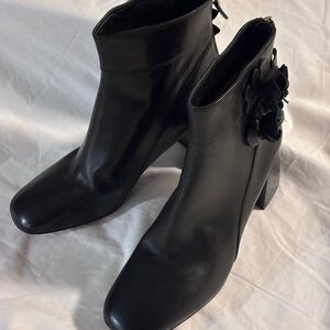 Tory Burch black bootie with flower detail